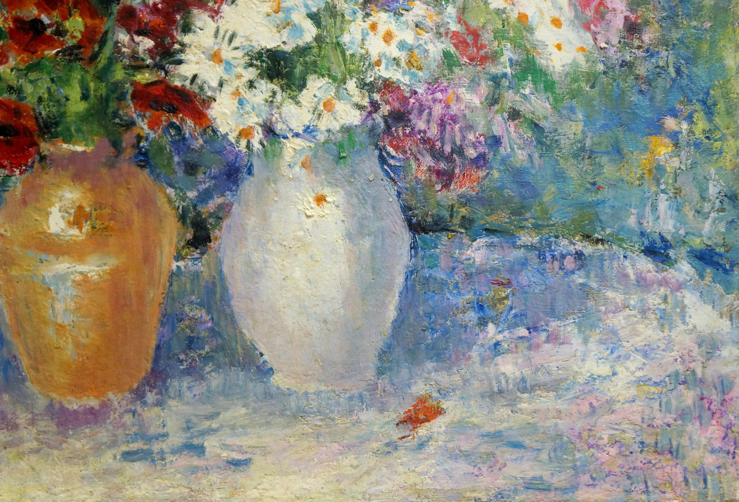 Oil painting of chamomiles and poppies in white ceramic vase