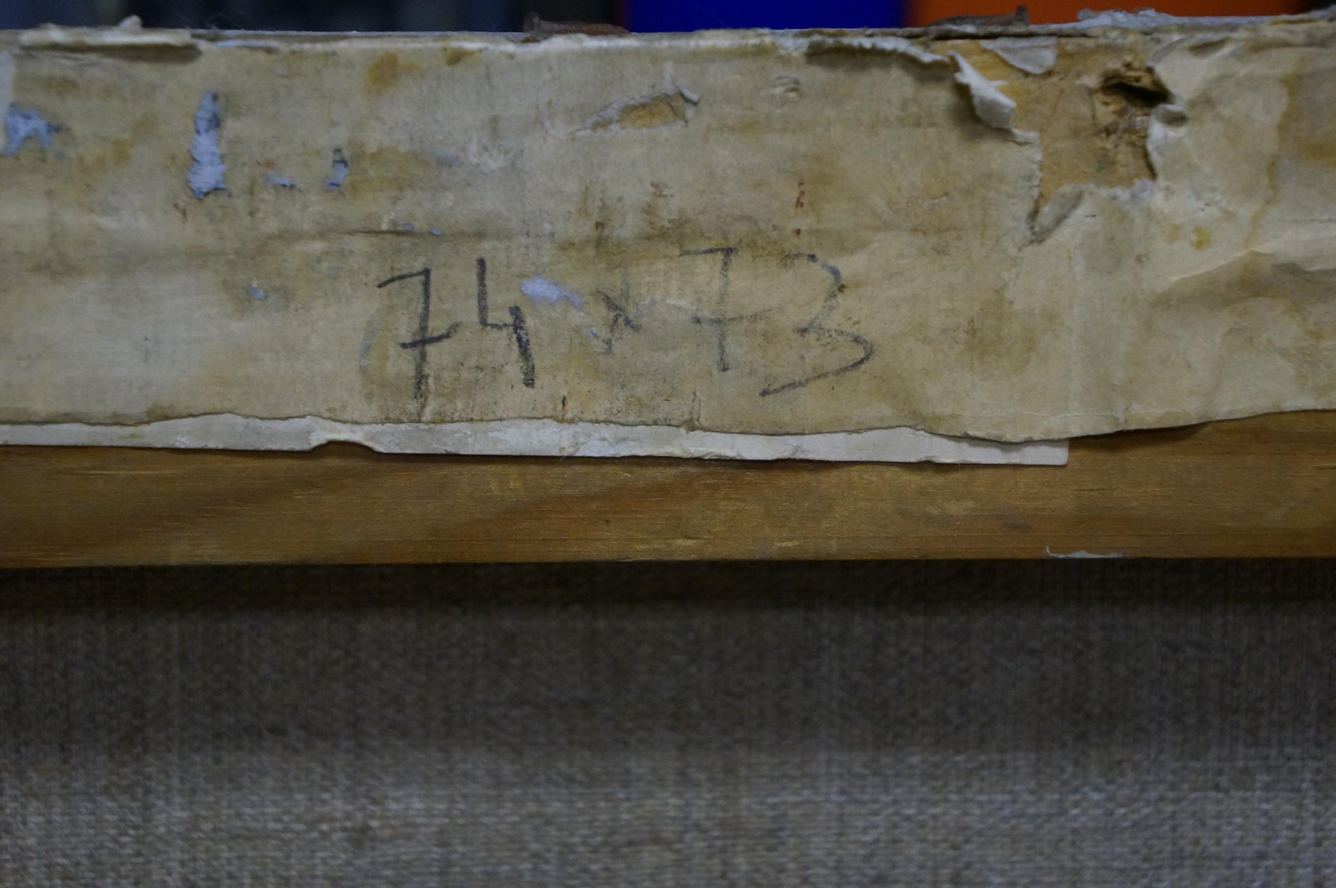 Weathered beige paper label on back of Village oil painting by Filbert Alexander Alexandrovich