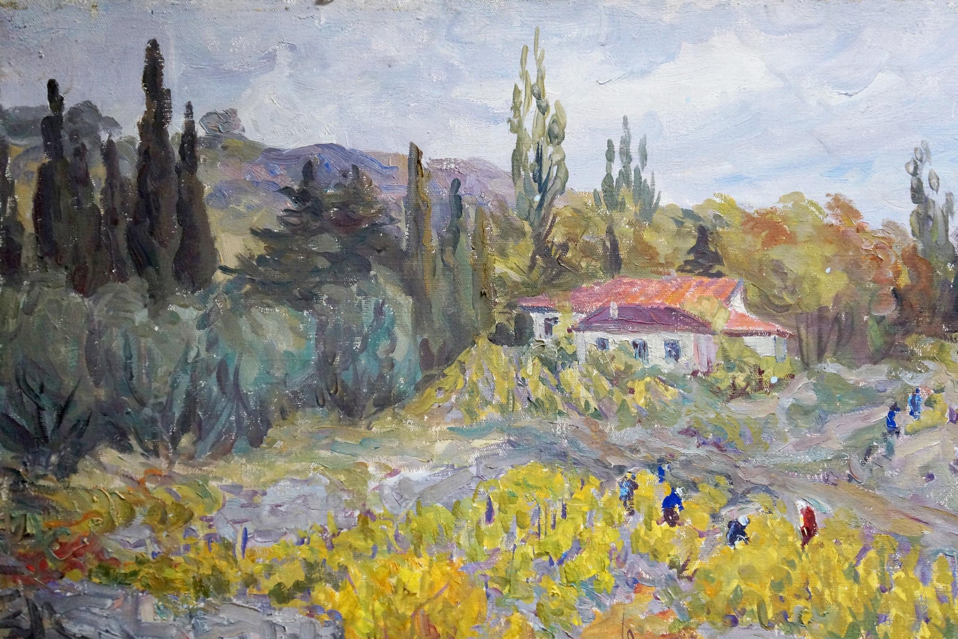 Oil painting by Basov Yakov Alexandrovich of rustic white house with red-tiled roof amid tall trees and yellow foliage