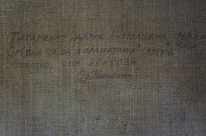 Back of oil painting Roses and fruits by Tytarenko Odarka Anatoliivna with faded Cyrillic script