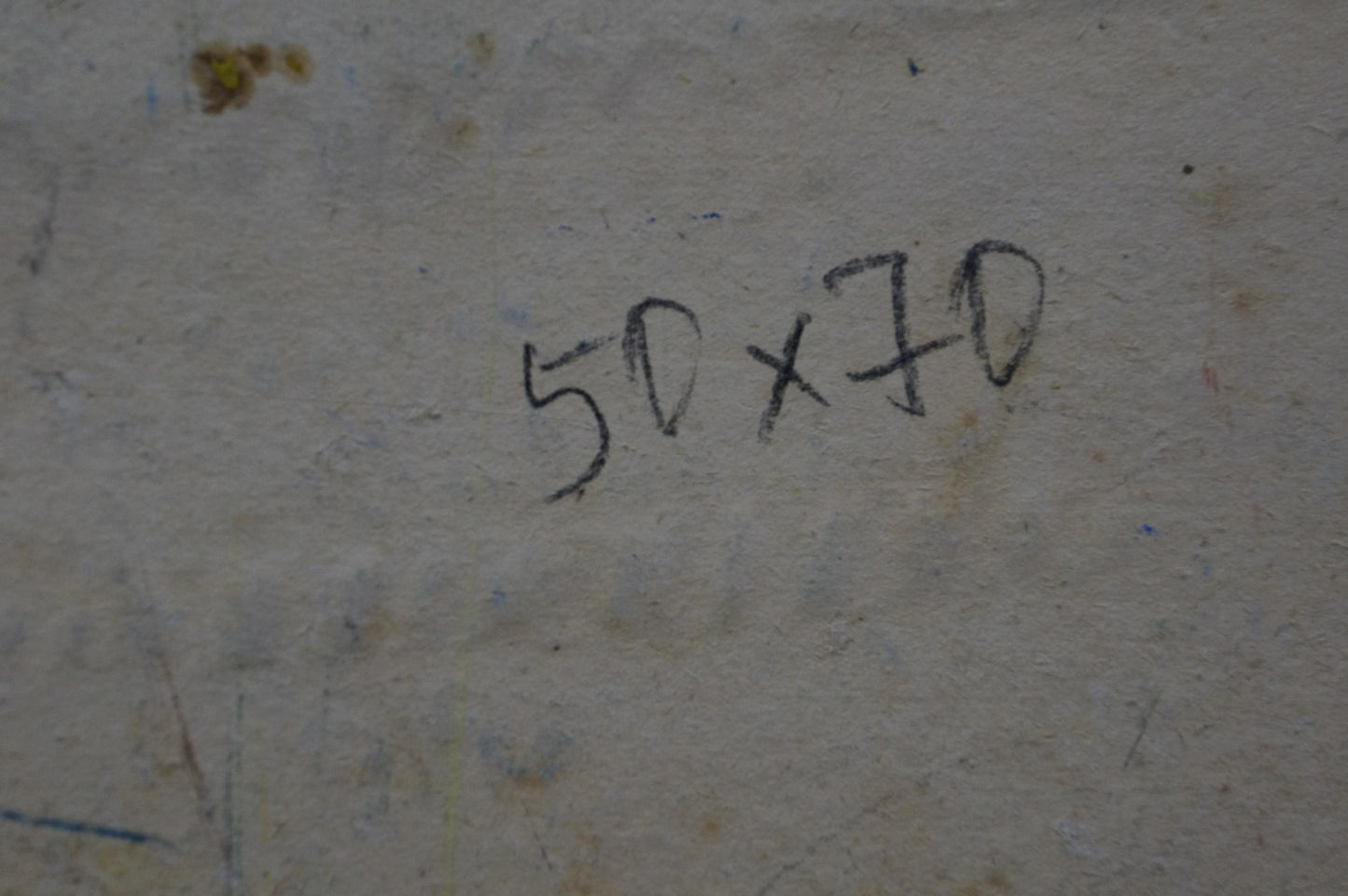 Black handwritten markings on textured off-white wall of Dupliy oil painting