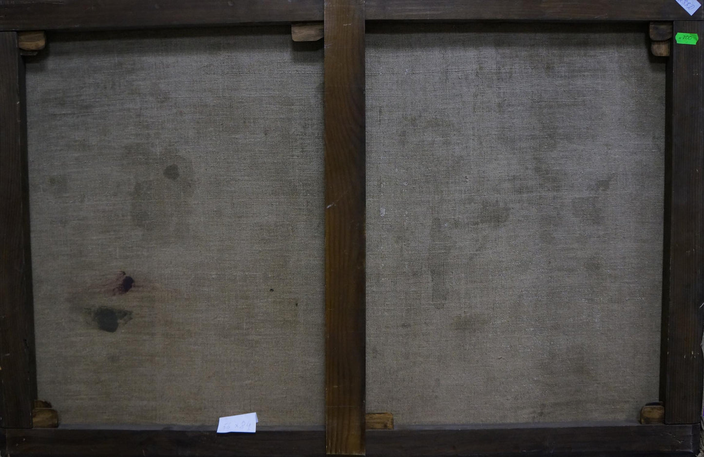 Back of Oil painting Room interior framed with dark wooden stretcher bars and gray canvas panels