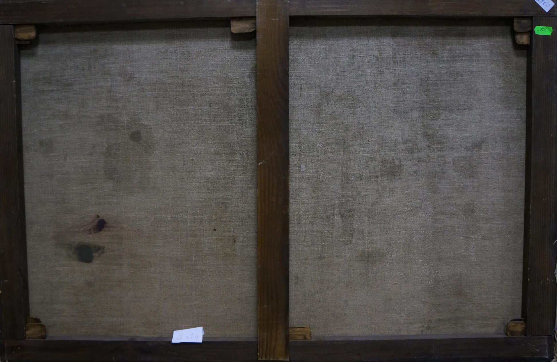 Back of Oil painting Room interior framed with dark wooden stretcher bars and gray canvas panels