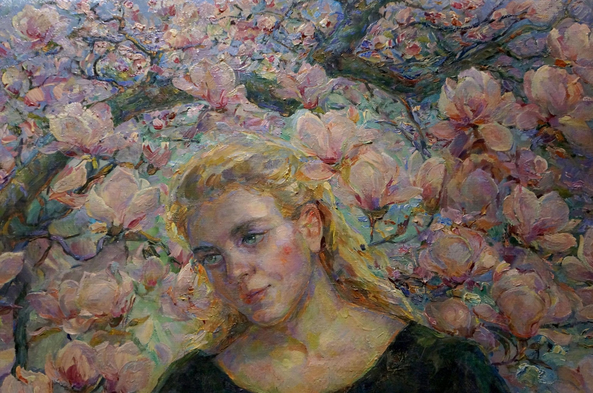Impressionistic oil painting by Titarenko Maria Anatolyevna: blonde woman in dark top among pink magnolias