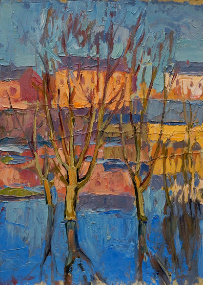 Impressionistic oil painting by Kiyansky Yuri Mikhailovich: bare trees, blue sky, cityscape