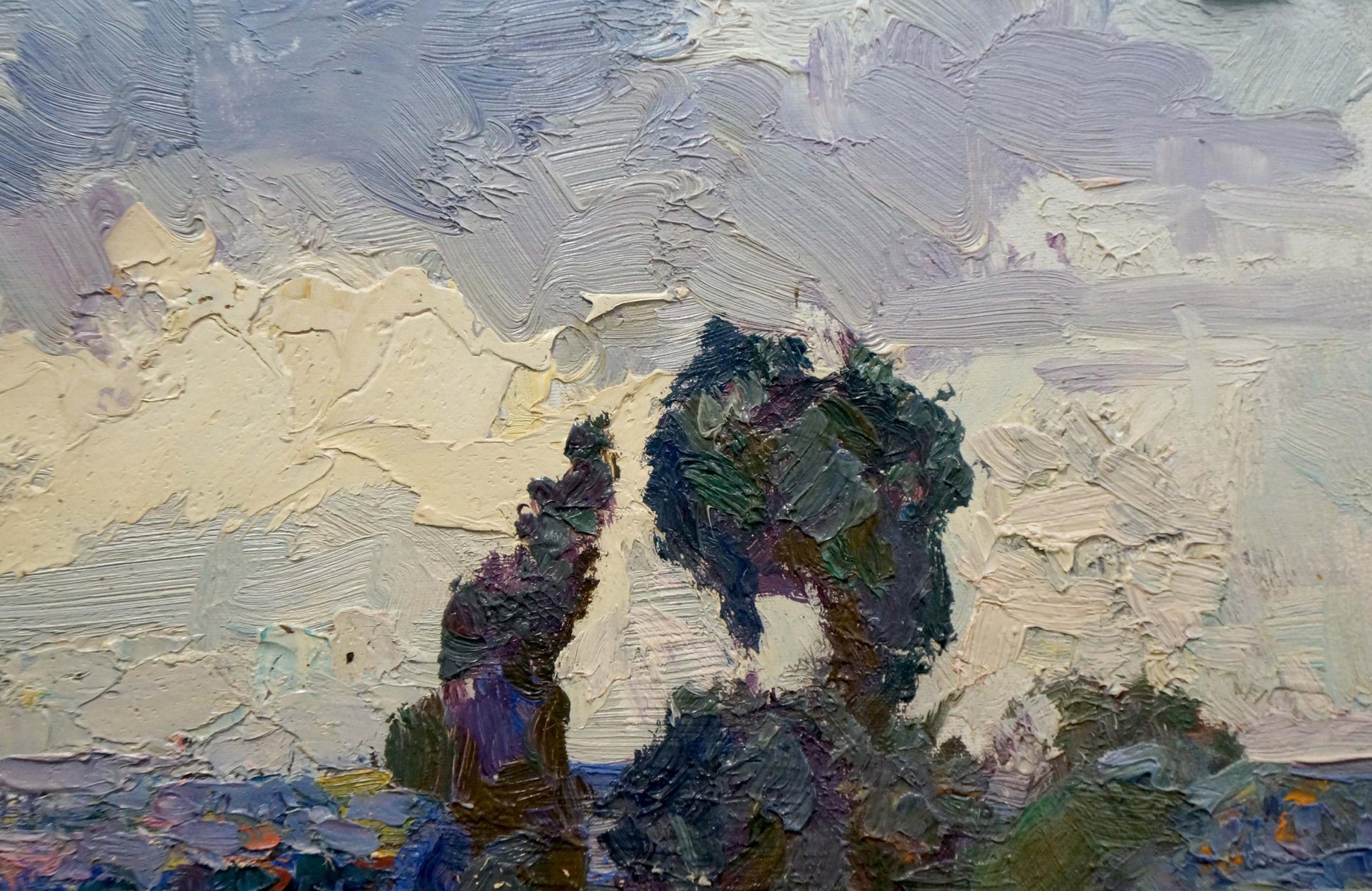 Impasto textured painting of two dark green and purple trees against a pale sky.