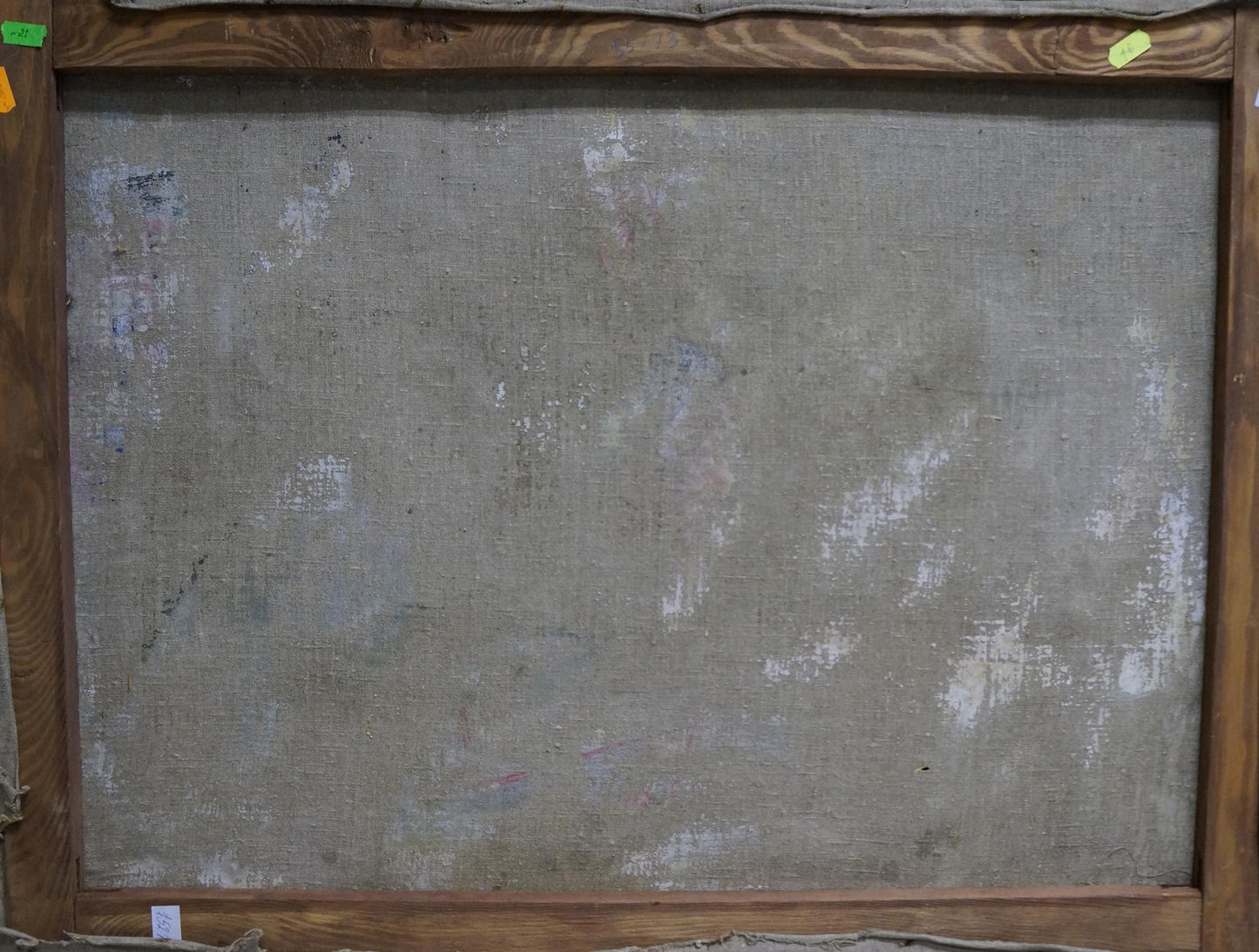 Back of wooden-framed oil painting By the River by unknown artist with gray textured canvas wear
