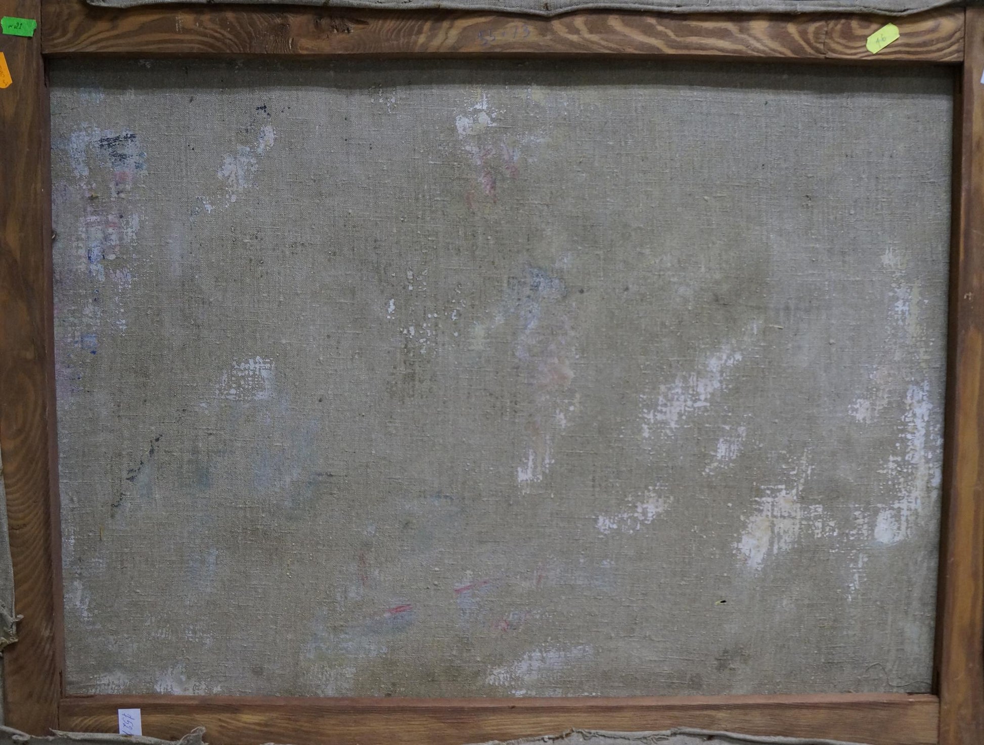 Back of wooden-framed oil painting By the River by unknown artist with gray textured canvas wear