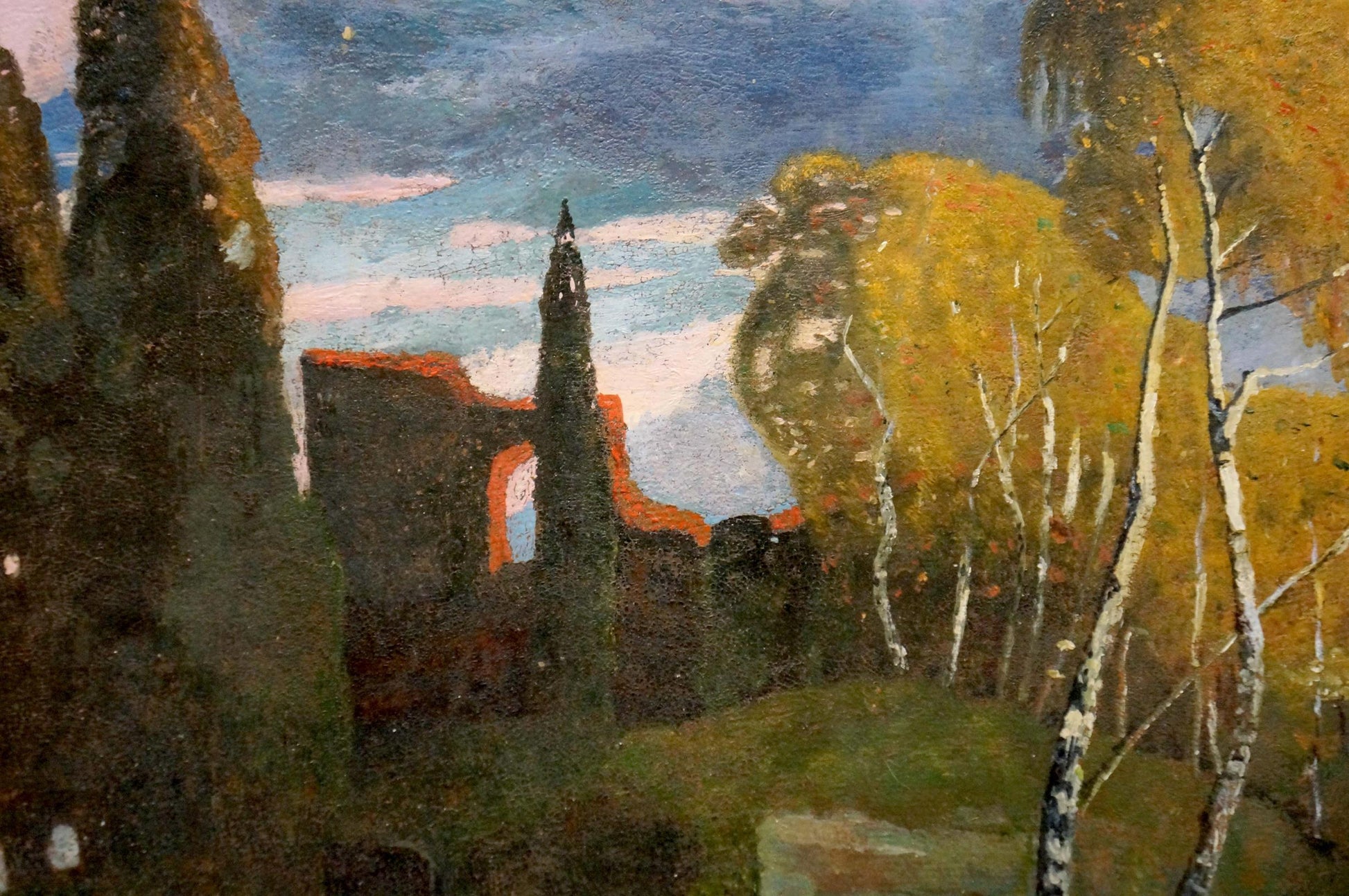Oil painting of autumn trees framing palace ruins