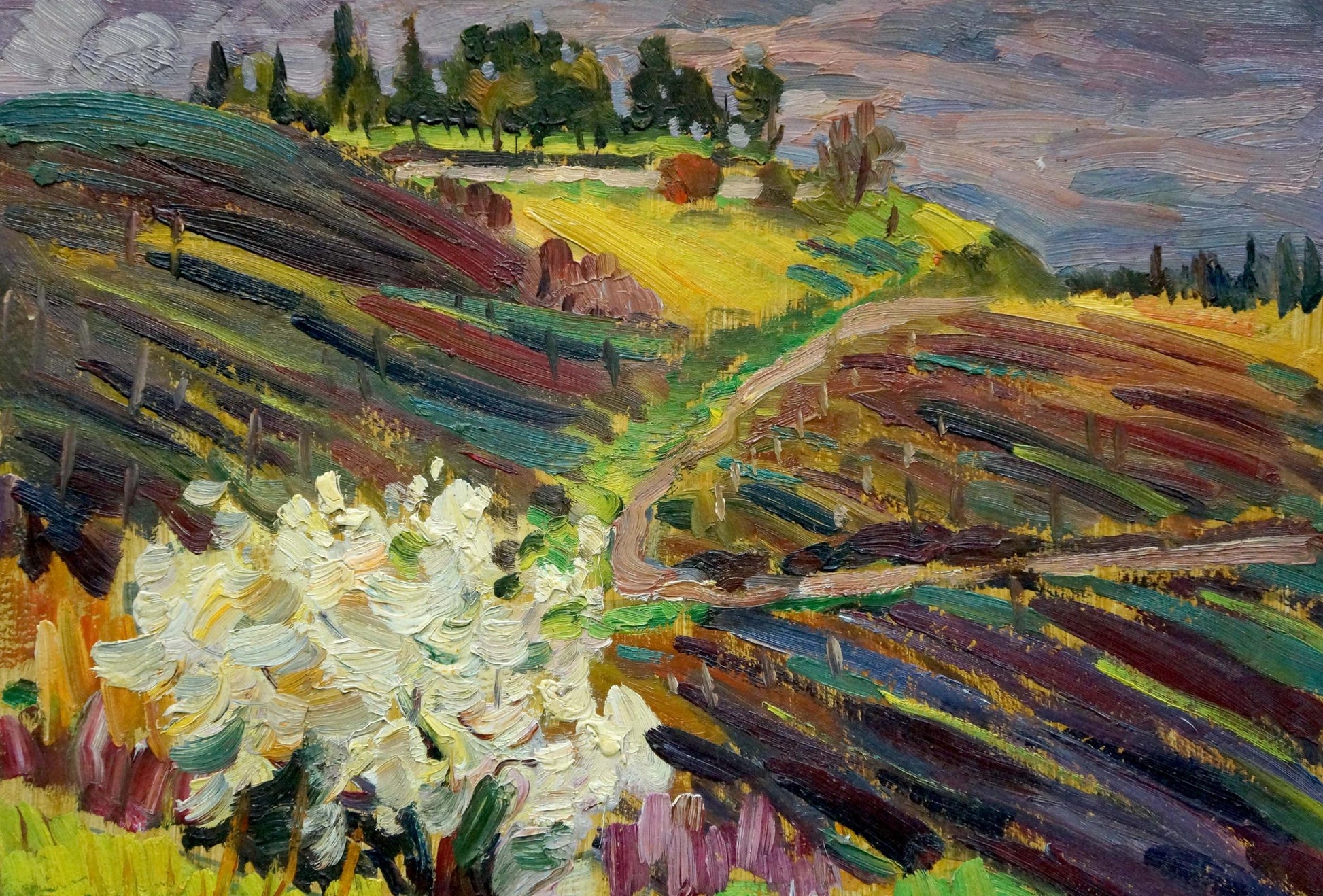 Vibrant impressionist oil painting by Kolomoitsev Petr Mikhailovich: rolling hills, path, white blossoms