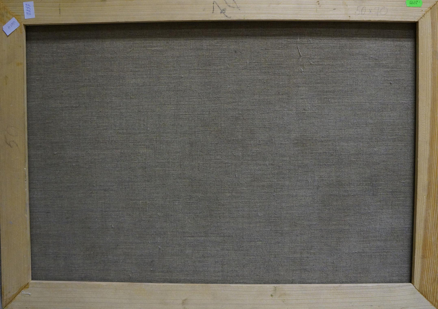 Back of framed Oil painting Cooking by Smirnov Valentin Sergeevic, gray fabric and wood frame