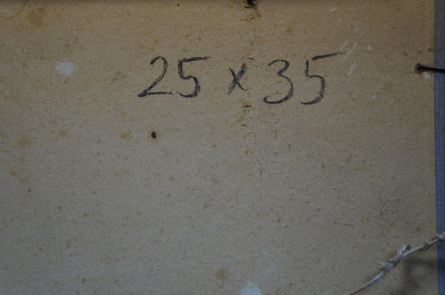 Back of Oil painting On the bay with handwritten 25 x 35 in black marker on beige