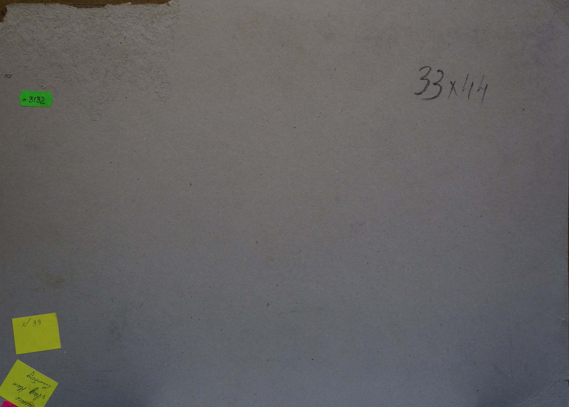 Back of oil painting Green streets in the village with gray textured wall, handwritten dimensions and sticky notes