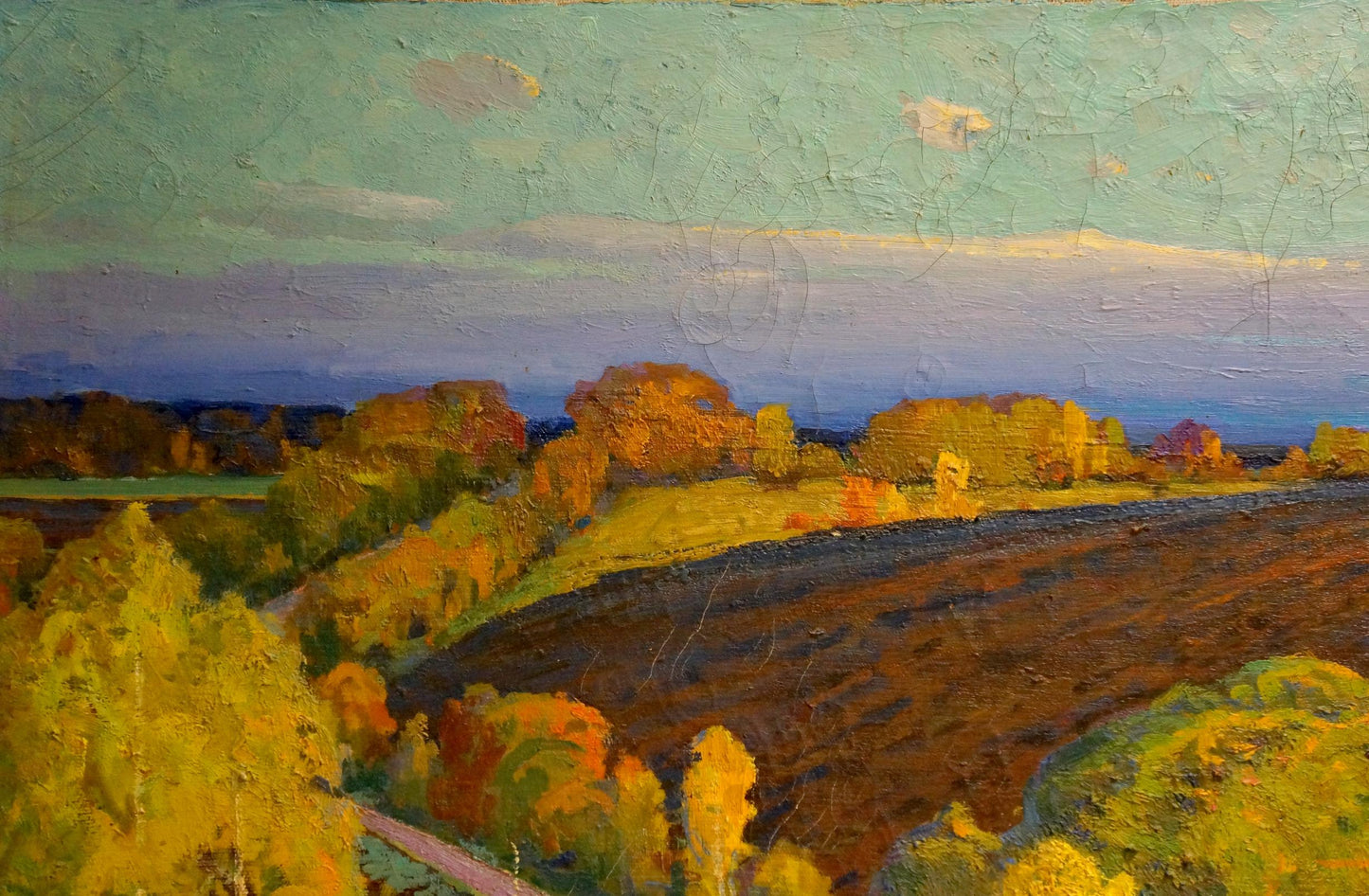 Oil painting by Korostelev Vladimir Alexandrovich: autumn fields with golden trees, teal sky, textured brushstrokes