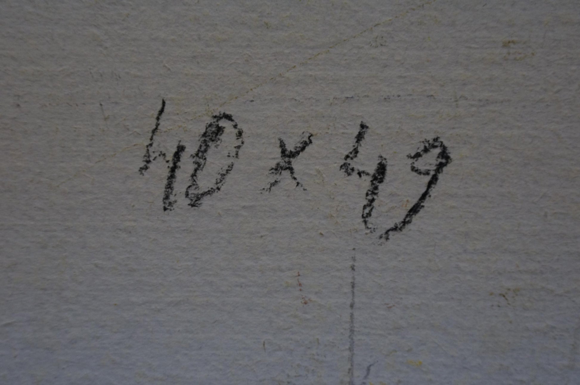 Black chalk markings on textured white wall of Gantman Moses Faybovich oil painting