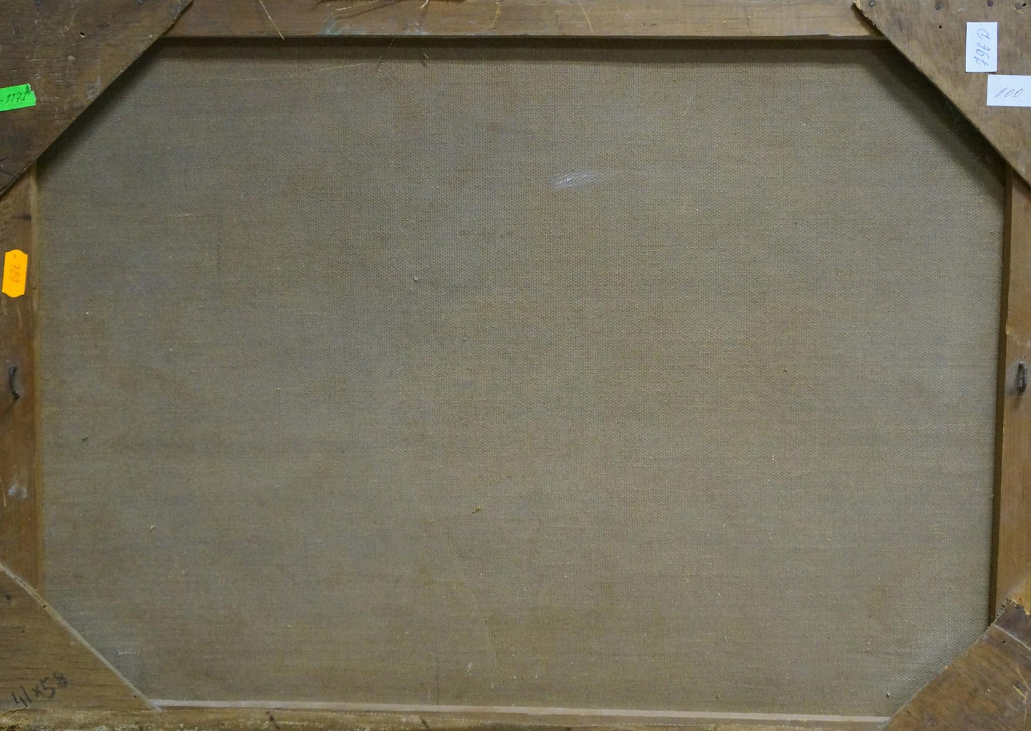 Back of framed oil painting The ship was caught in a storm with beige canvas and labels