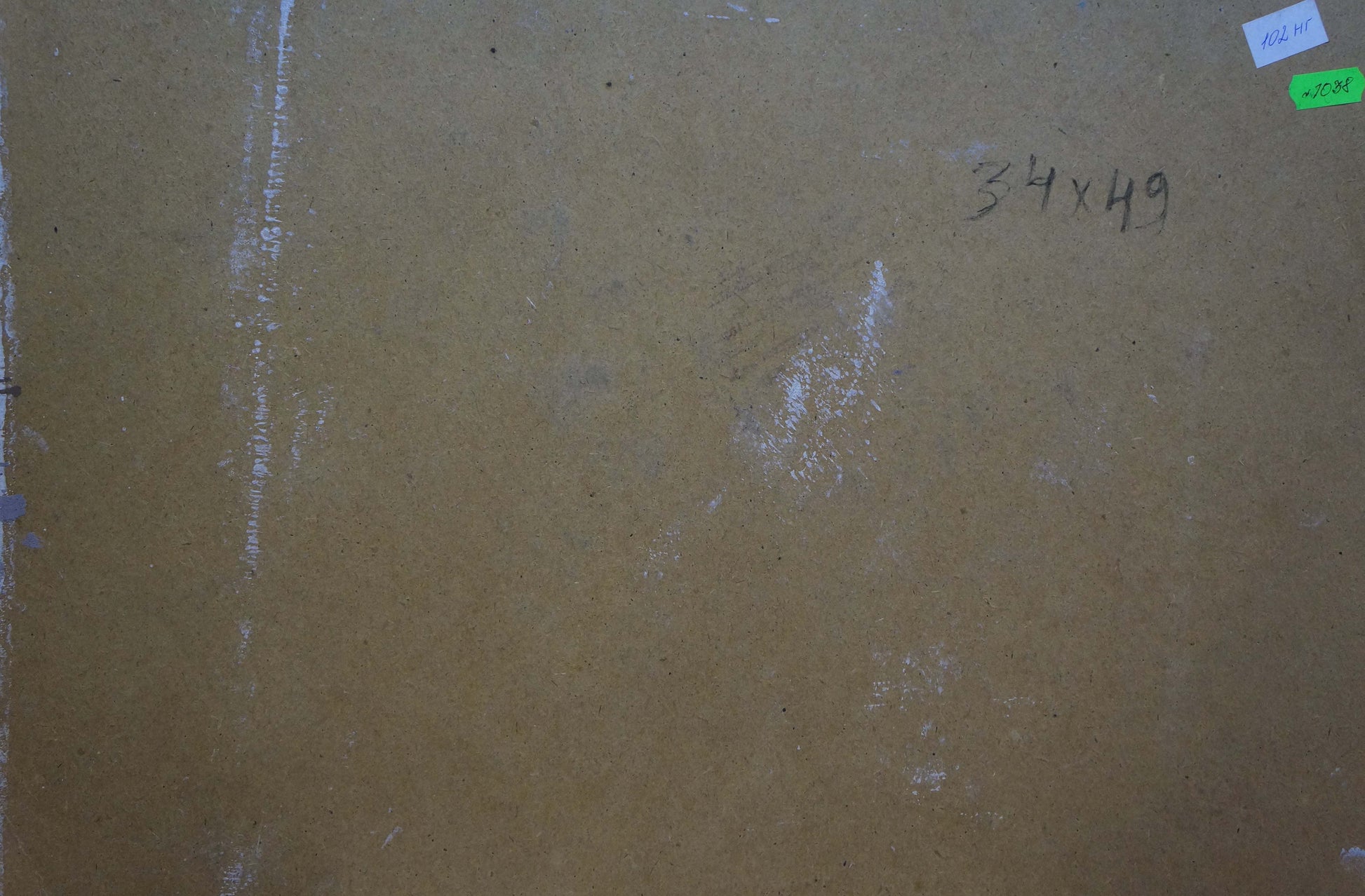 Back of Oil painting Sunflower field with tan textured surface, handwritten dimensions and adhesive labels