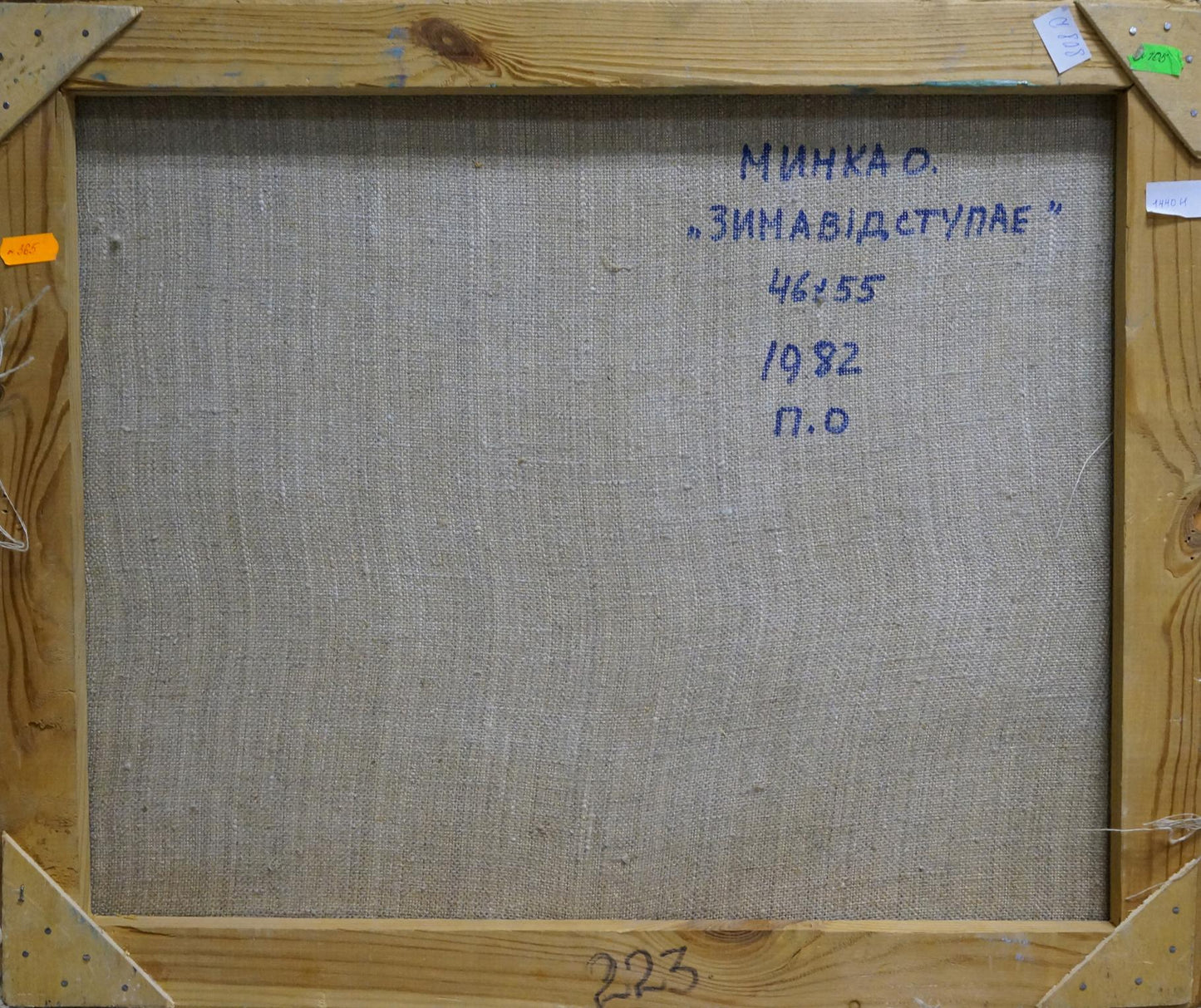 Back of Alexander Mynka oil painting The first snow fell in the forest with blue handwritten text on beige linen