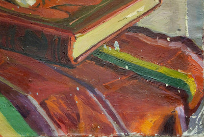 Oil painting Still life by Volkov Efim Efimovich: stacked books in red, orange, green