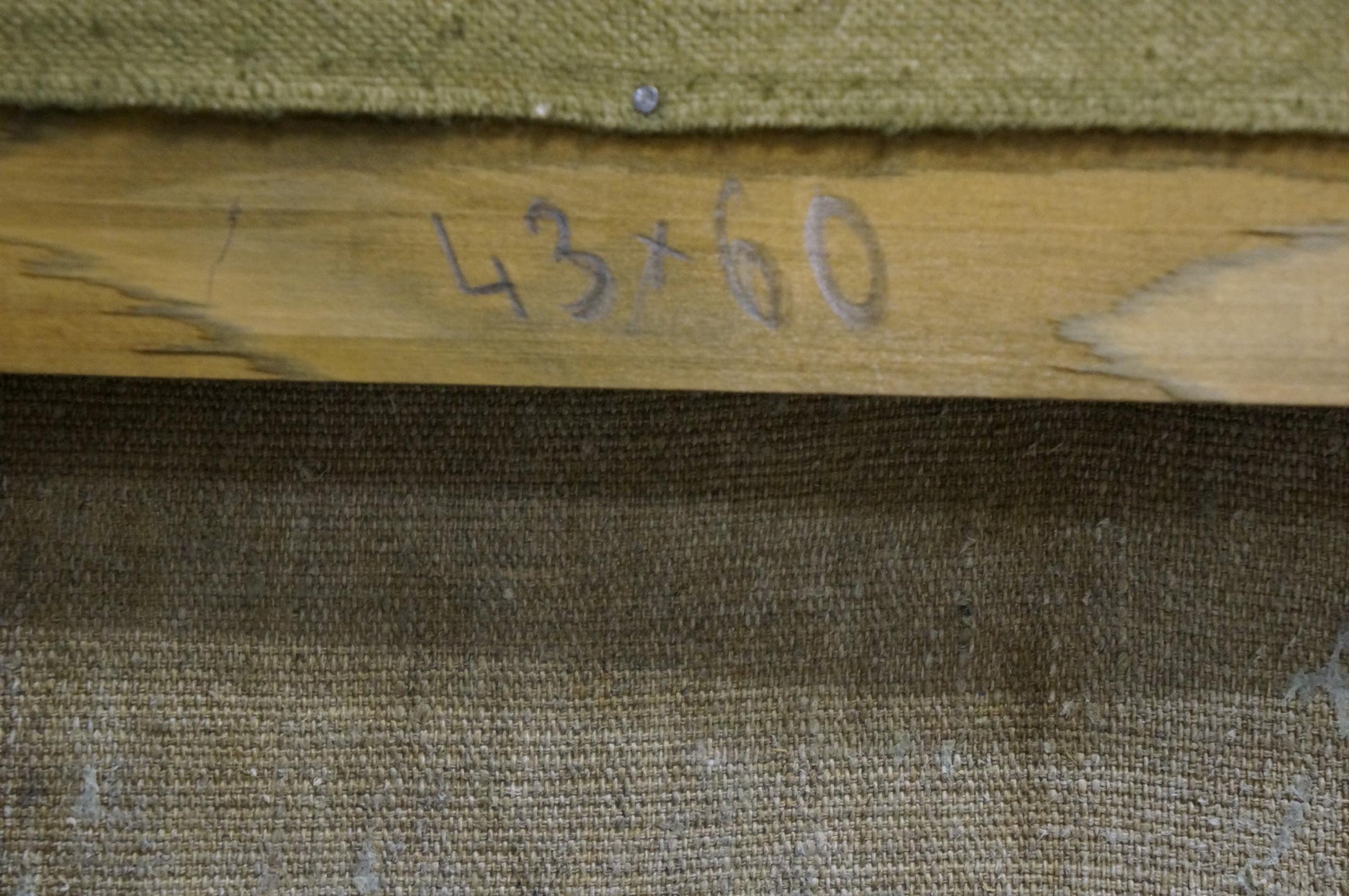 Back of Oil painting Daisies with 43x60 measurements on wooden beam