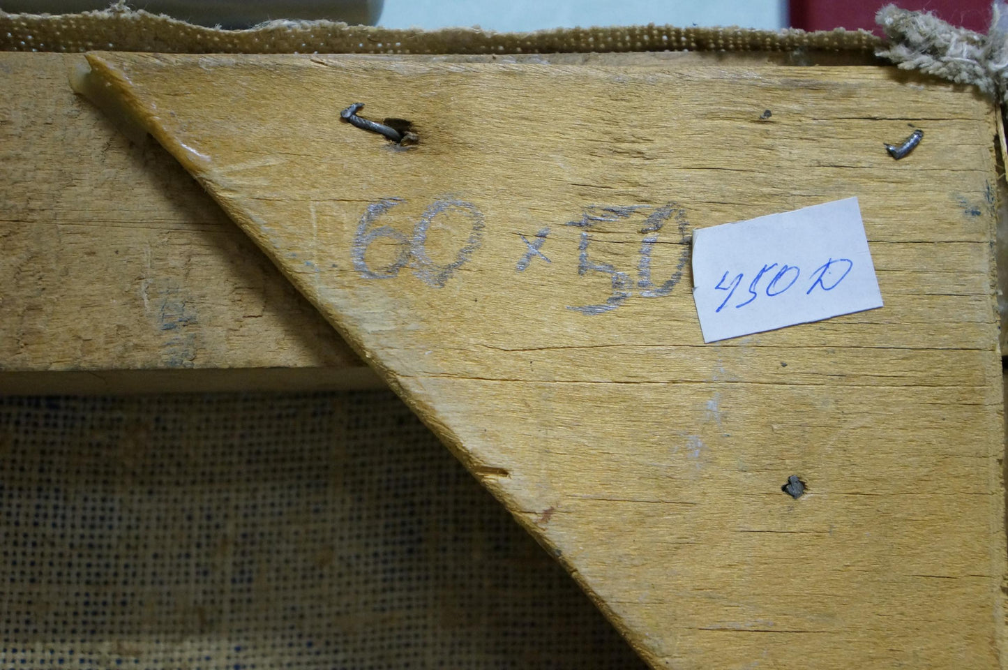 Back of abstract oil painting by Alexander Nikolaevich Lozovoi on worn yellow stretcher bar with dimensions and price tag