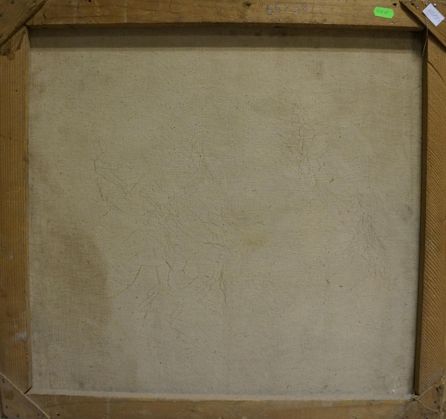 Back of beige canvas oil painting Undraped girl in wooden frame