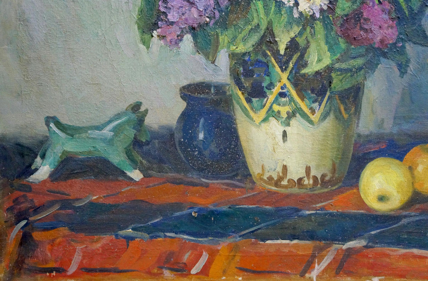 Oil painting of purple hydrangeas in cream vase with blue yellow patterns