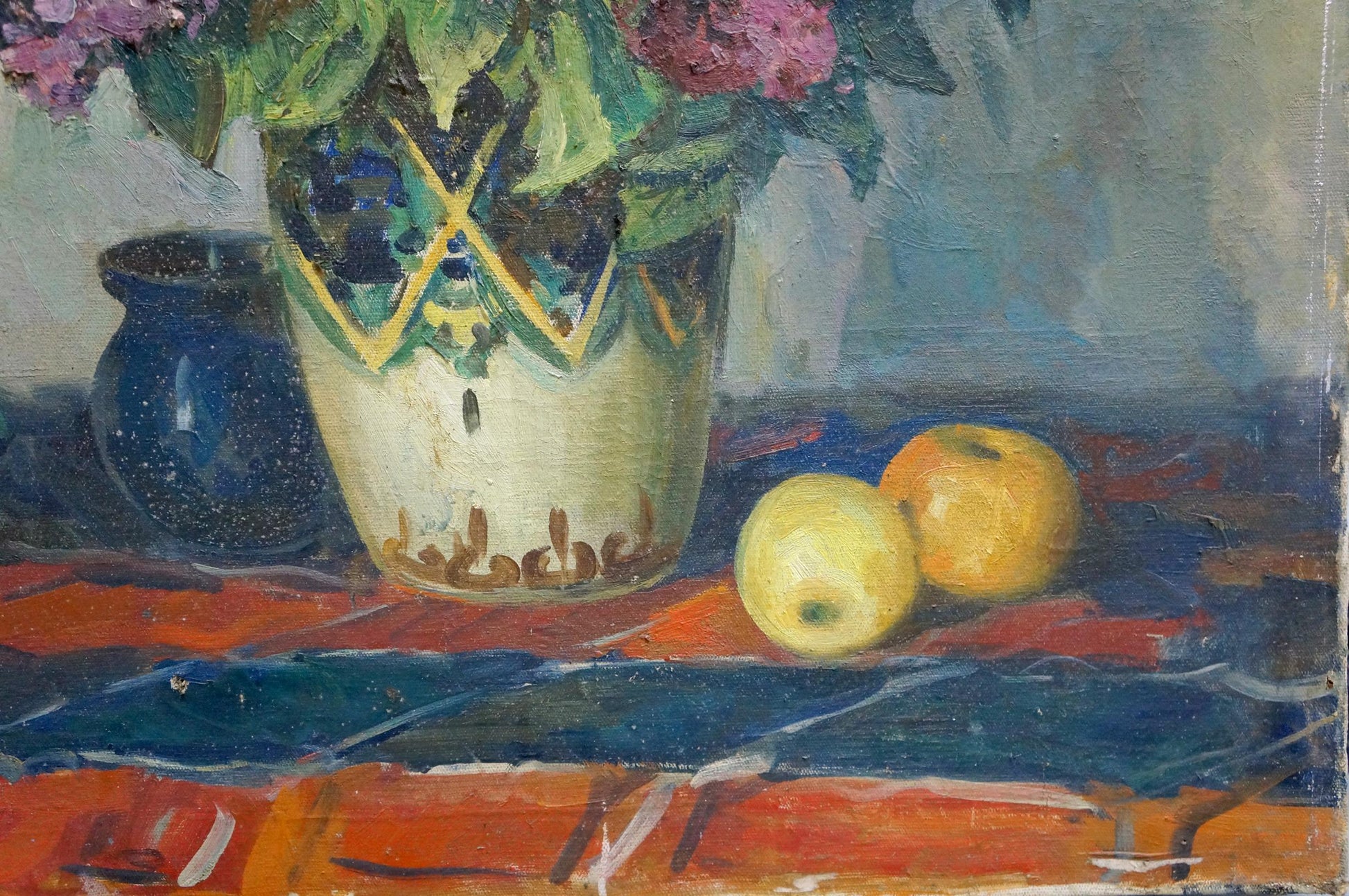Oil painting of bouquet in cream vase with green-yellow geometric pattern