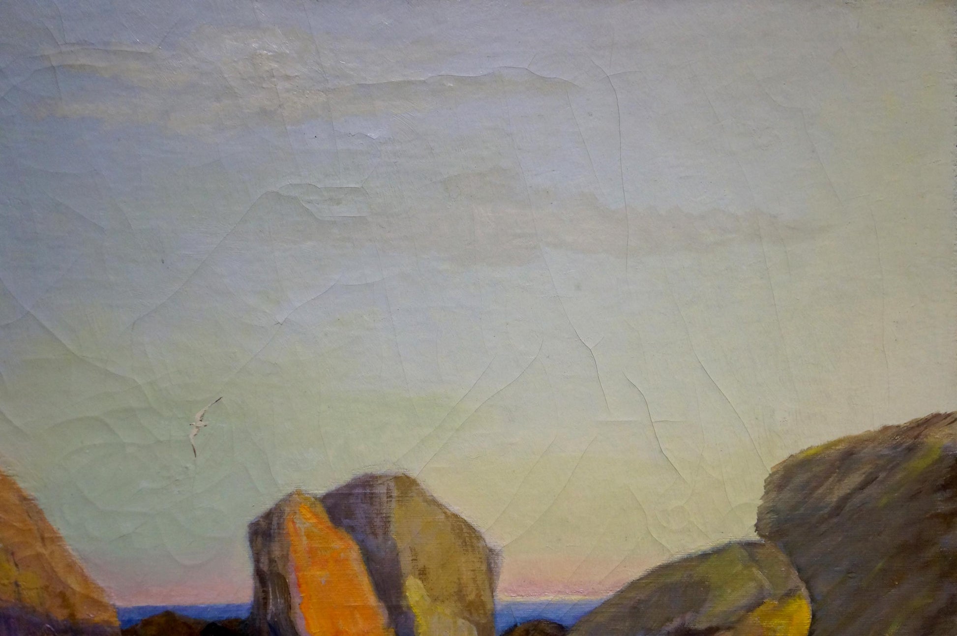Oil painting Near the Shore by Zharenko Lavrentiy Semenovich, rugged rocks at sunset