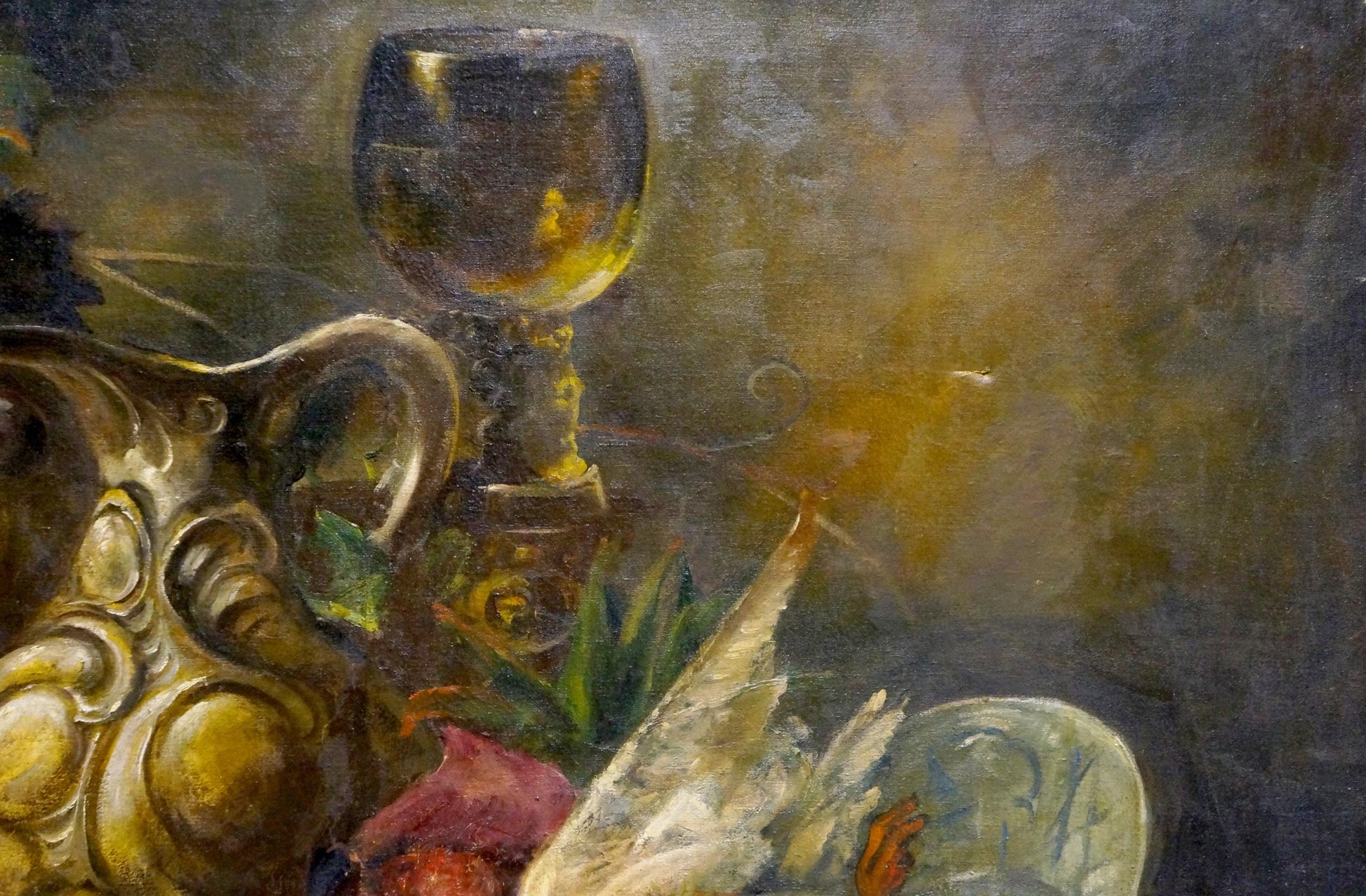 Oil painting of gilded ornate silver goblet in still life feast