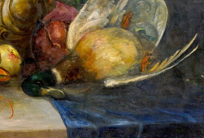 Oil painting of still life feast with green-headed duck on blue cloth