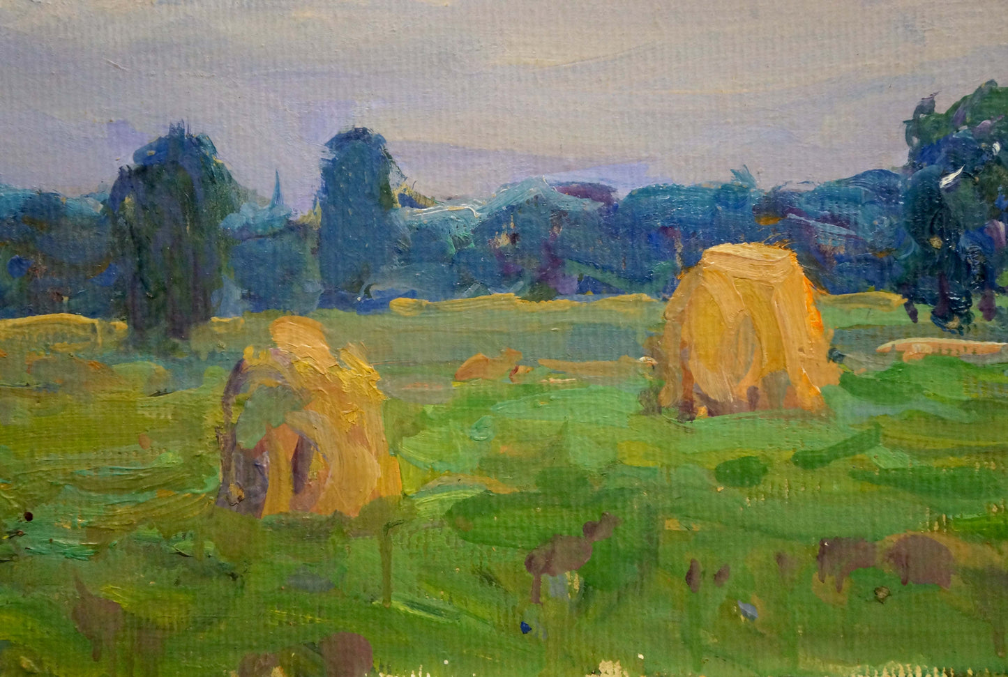 Oil painting of golden hay bales in green field by Fomin Anatoly Nikiforovich