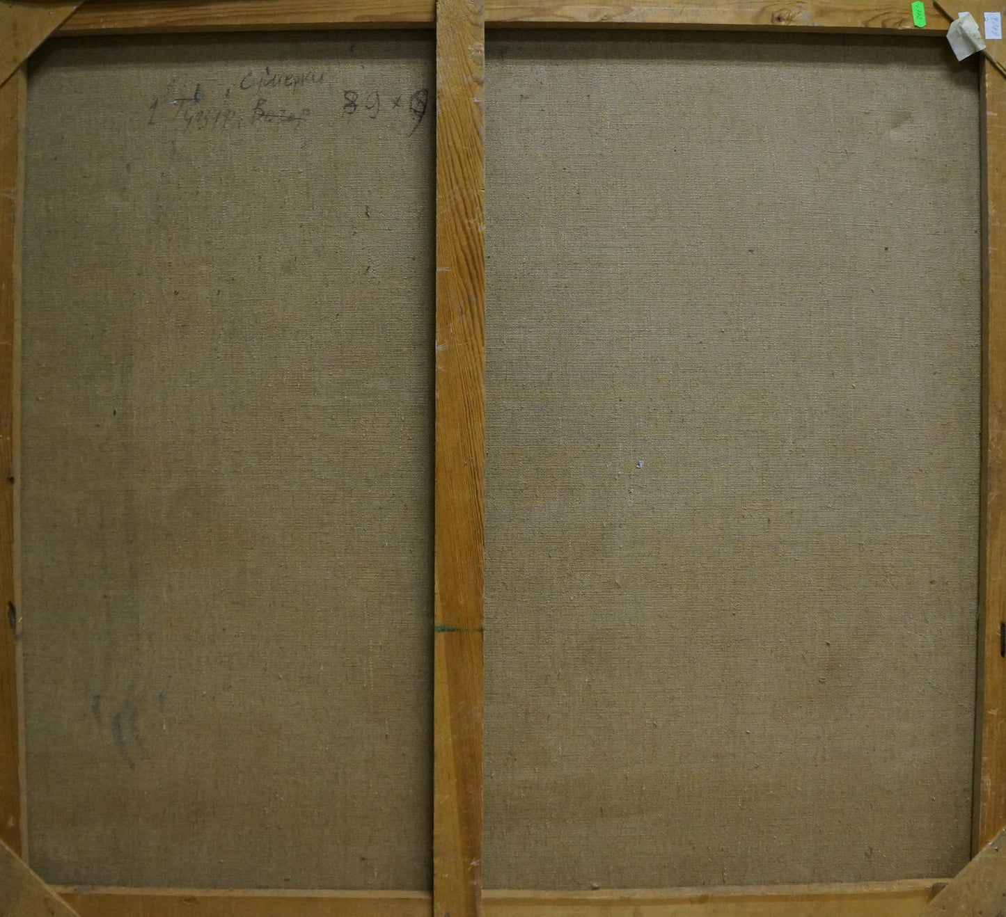 Back of Twilight oil painting: two-panel wooden frame with beige linen and handwritten markings