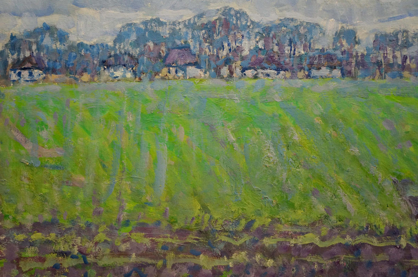 Oil painting by Kolosovsky Georgy Sergeevich: vibrant green field to blue hills under cloudy sky