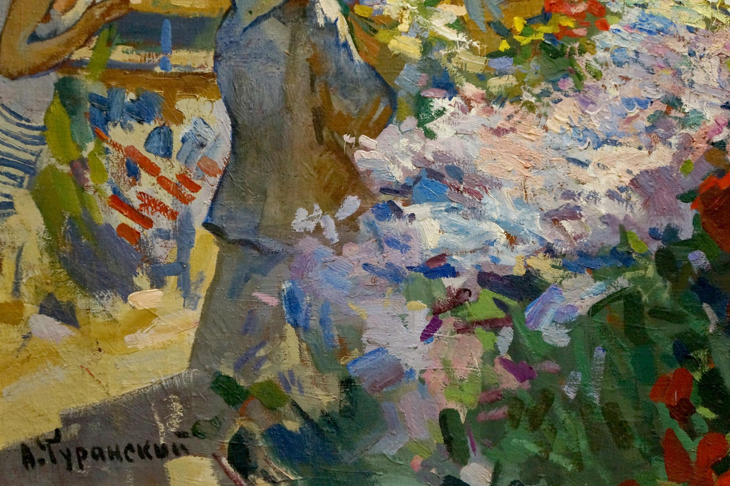 Vibrant impressionistic oil painting by Turansky Alexander Alekseevich of figure in blue-gray amid colorful flowers