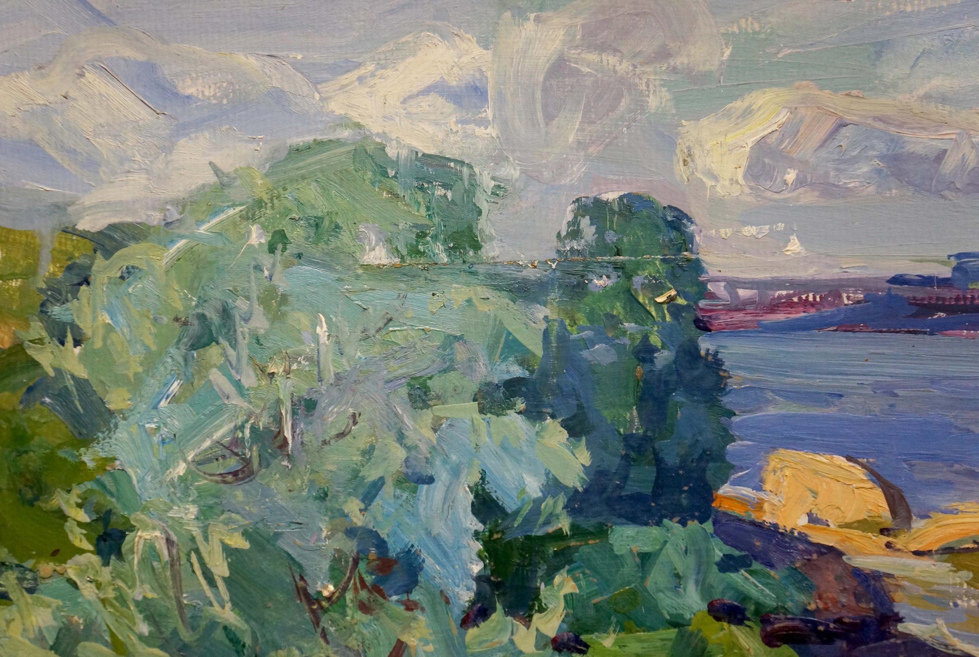 A vibrant impressionistic painting featuring lush green foliage in the foreground, with soft blues and purples blending into a distant shoreline under a cloudy sky.