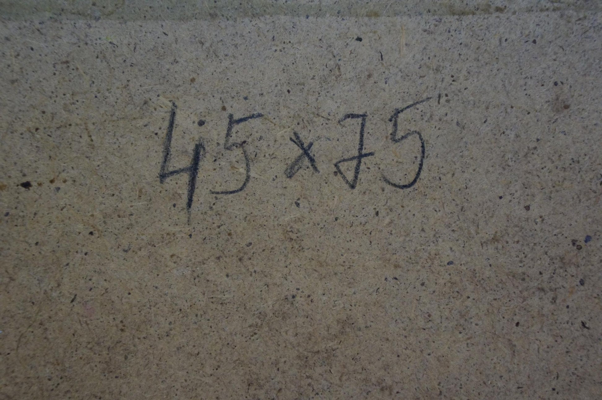 Black handwritten markings on speckled gray concrete in Oil painting Dance