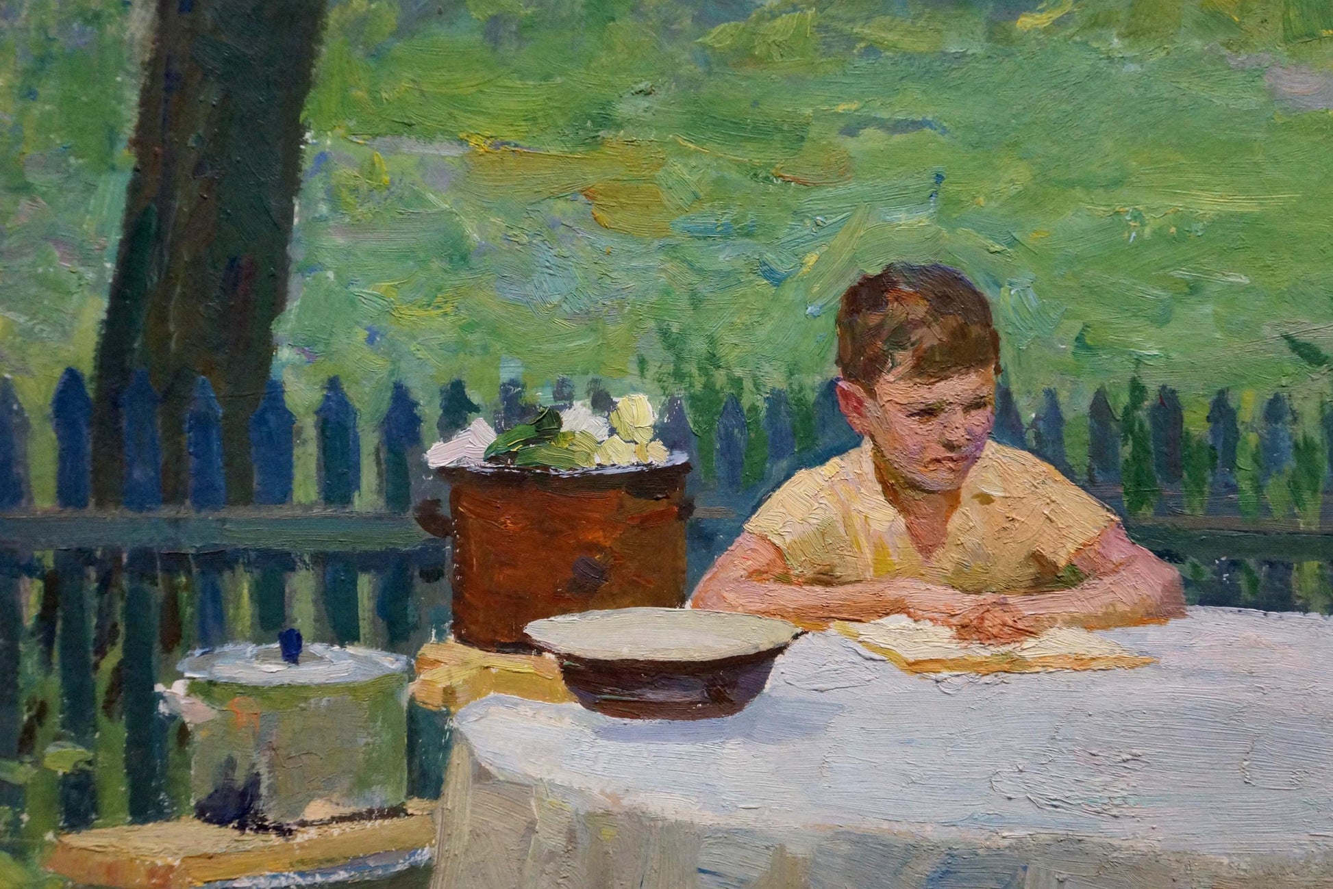 Oil painting of family at table with young boy in yellow shirt reading
