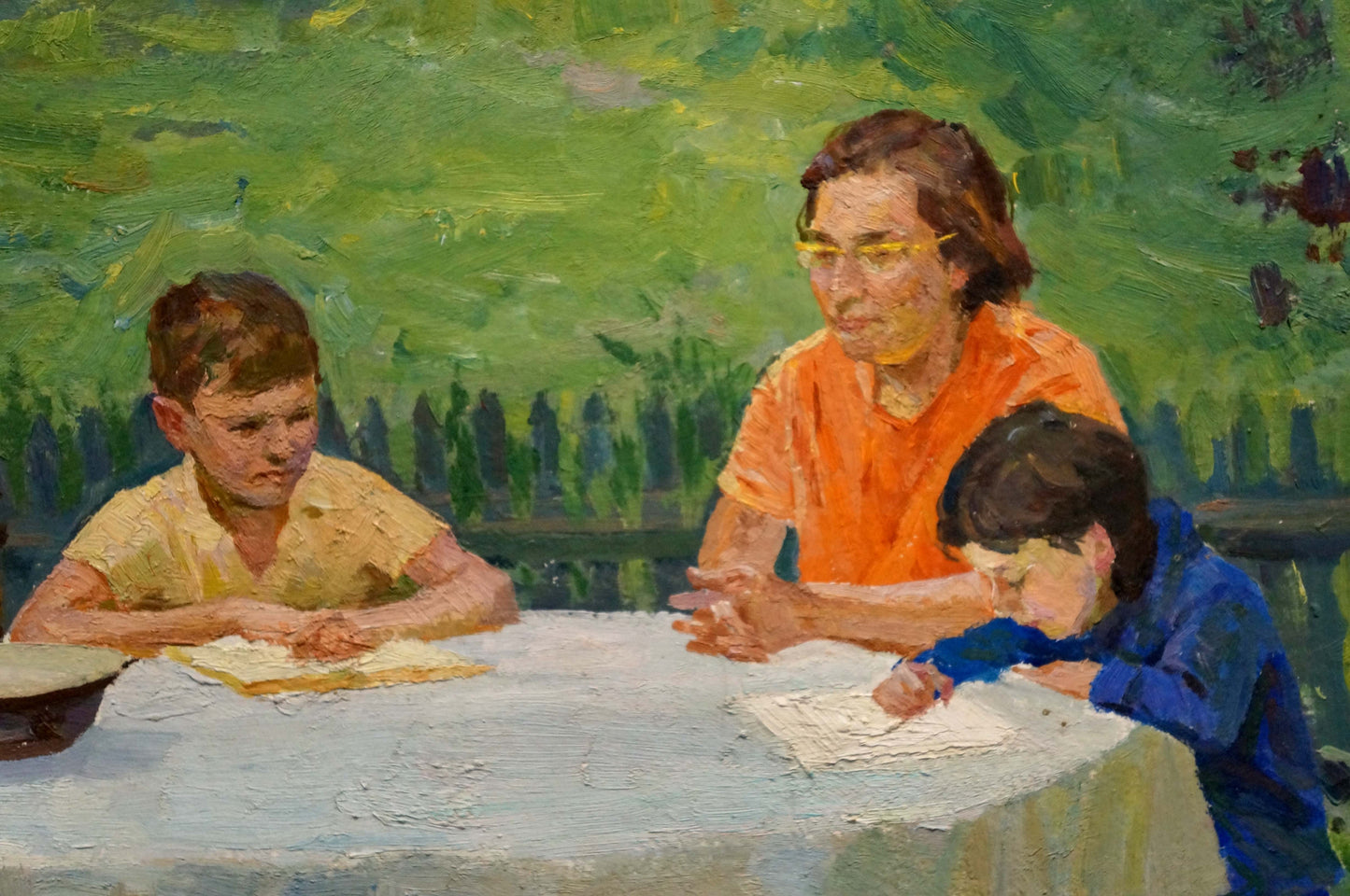 Oil painting Family at the table: warm-toned woman in orange shirt and kids outdoors