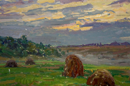 Oil painting Sunset by Fomin Anatoly Nikiforovich: rustic hay bale in green field under dramatic sky