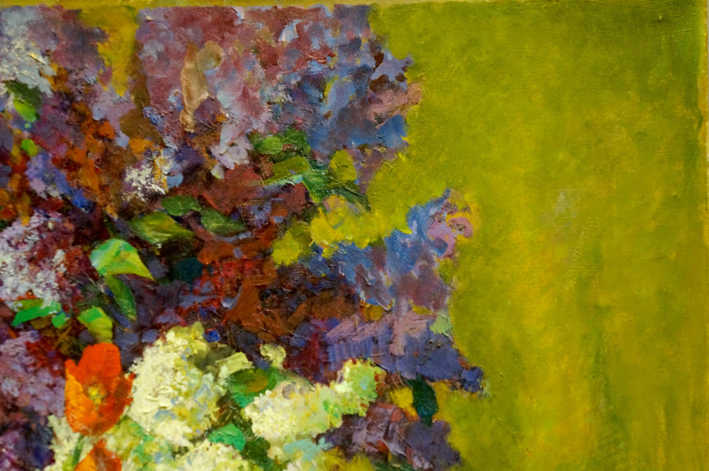 Vibrant oil painting of lilacs and tulips on table by Leonid Zhabinsky