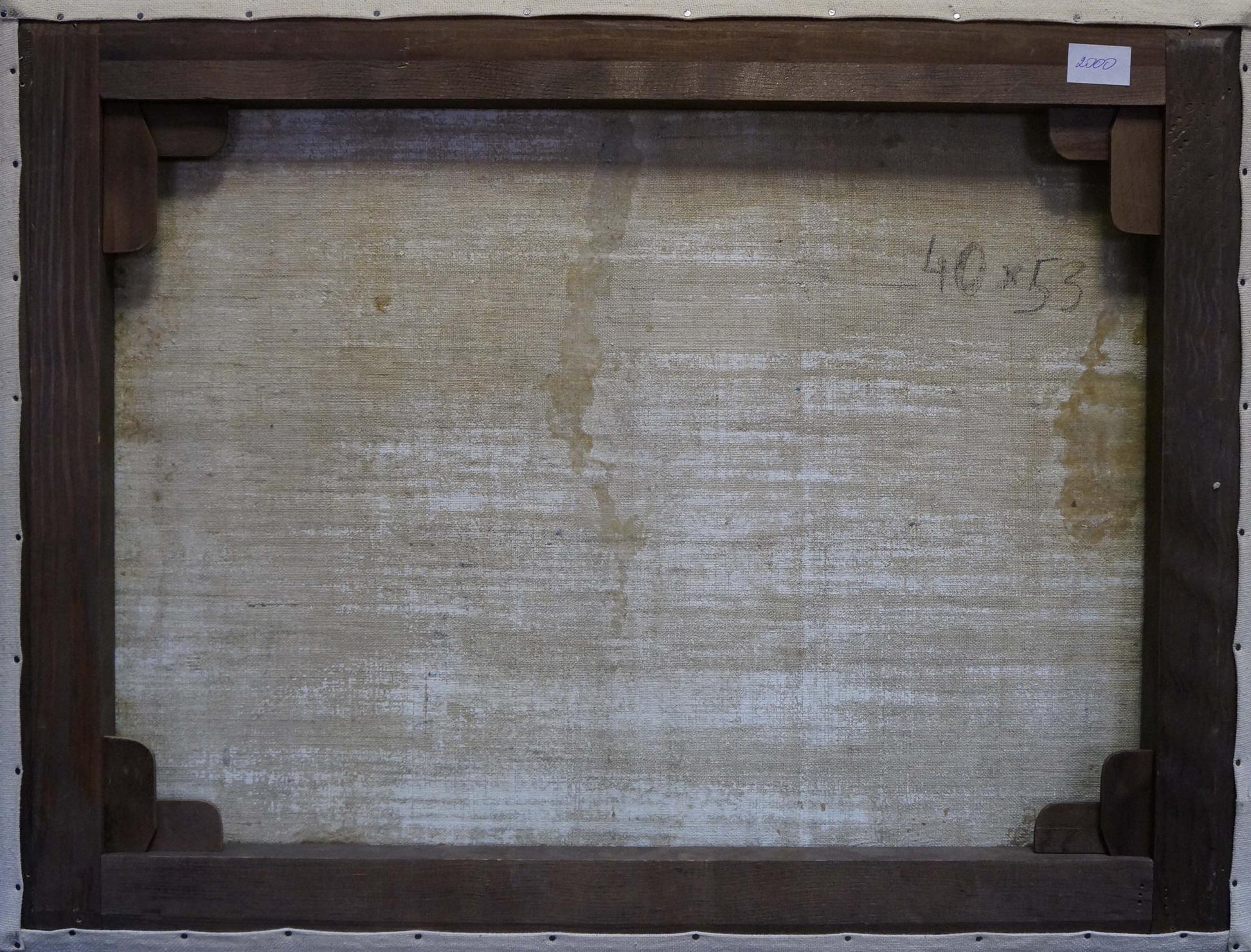 Back of Oil painting The streets of the city in dark wooden frame with weathered off-white canvas and faint pencil markings