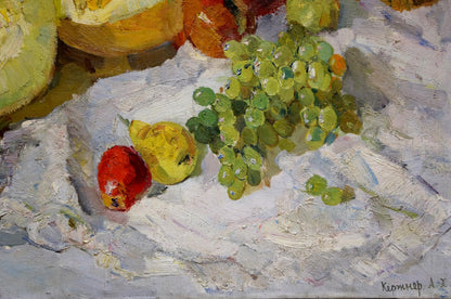 Impressionistic oil painting of green grapes, orange accents, flowers and melon on table by Alexander Kerzhner