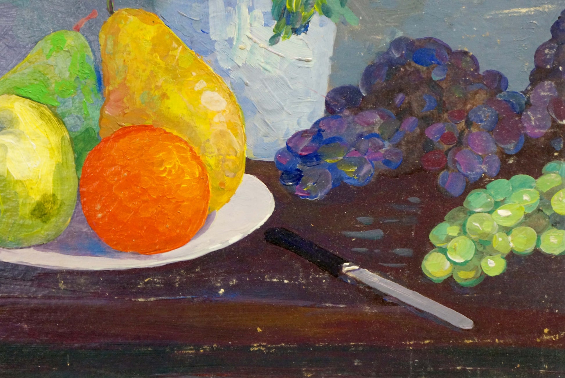 Oil painting of sweet still life with pears, orange, grapes on plate