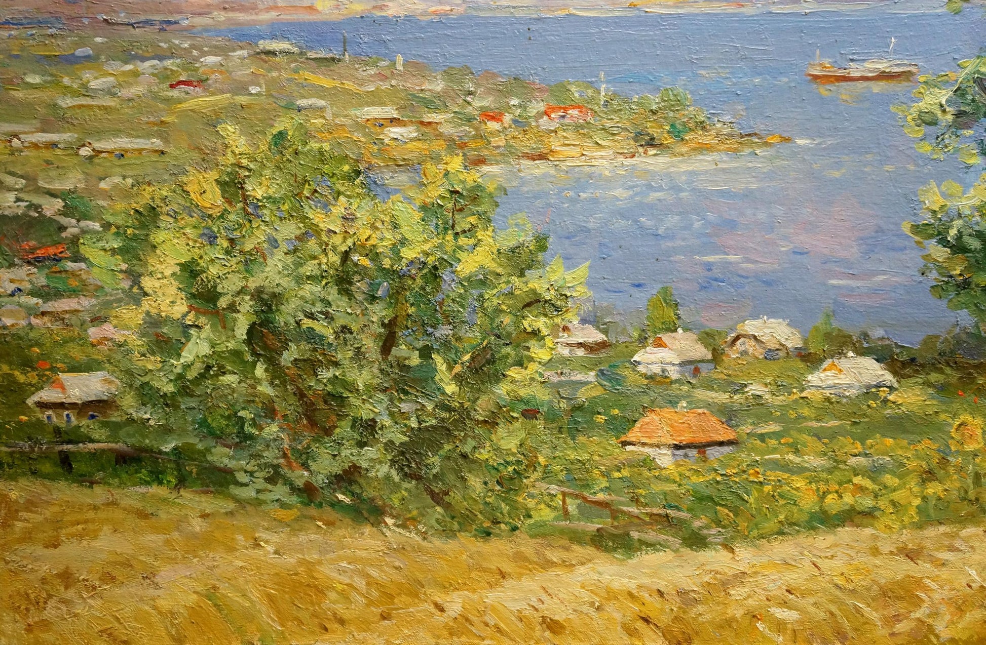 Vibrant oil painting by Khodchenko Lev Pavlovich of sunlit coastal village