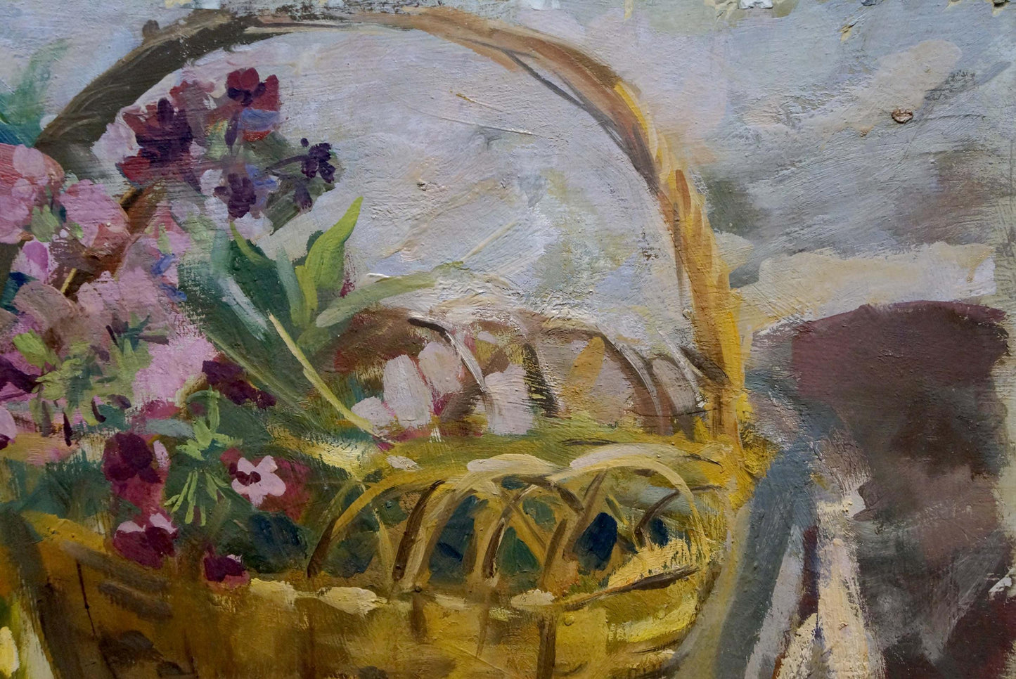 Oil painting of woven yellow basket with pink purple flowers