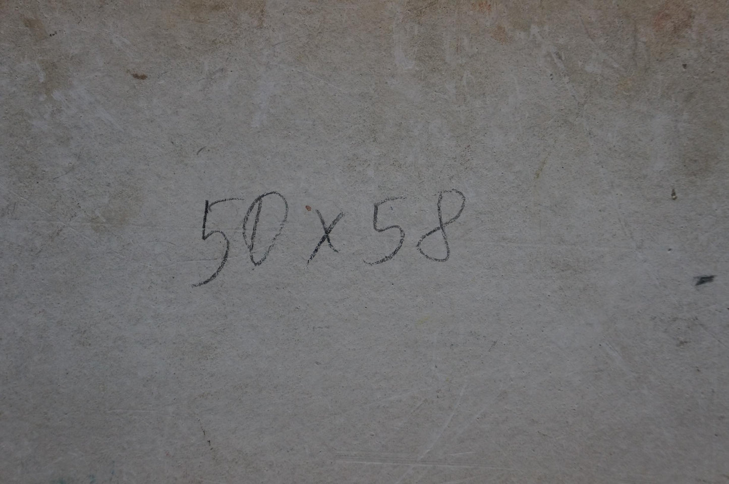 Back of Oil painting Flowers and fruits with 50x58 inch handwritten markings on gray concrete