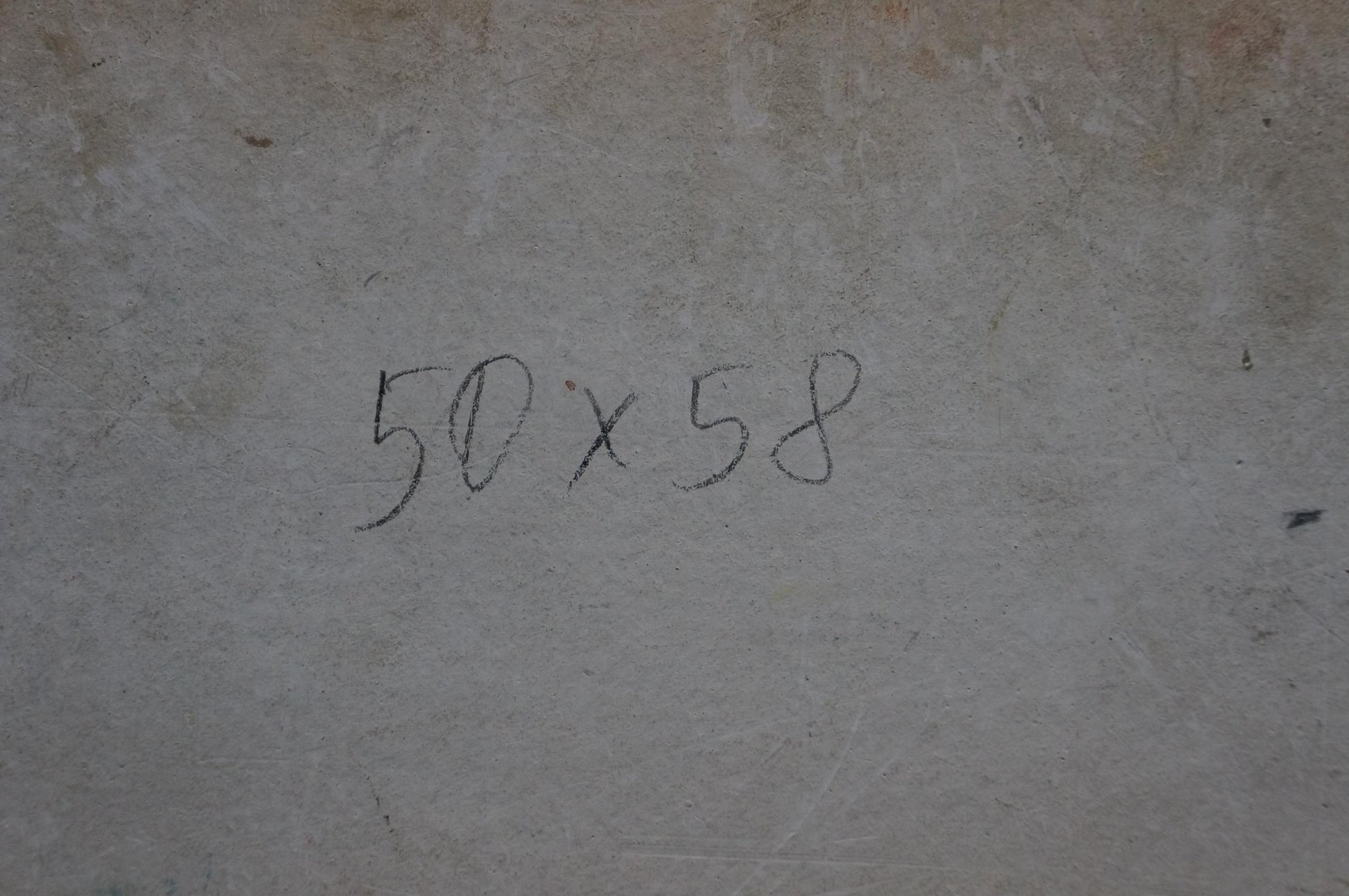 Back of Oil painting Flowers and fruits with 50x58 inch handwritten markings on gray concrete