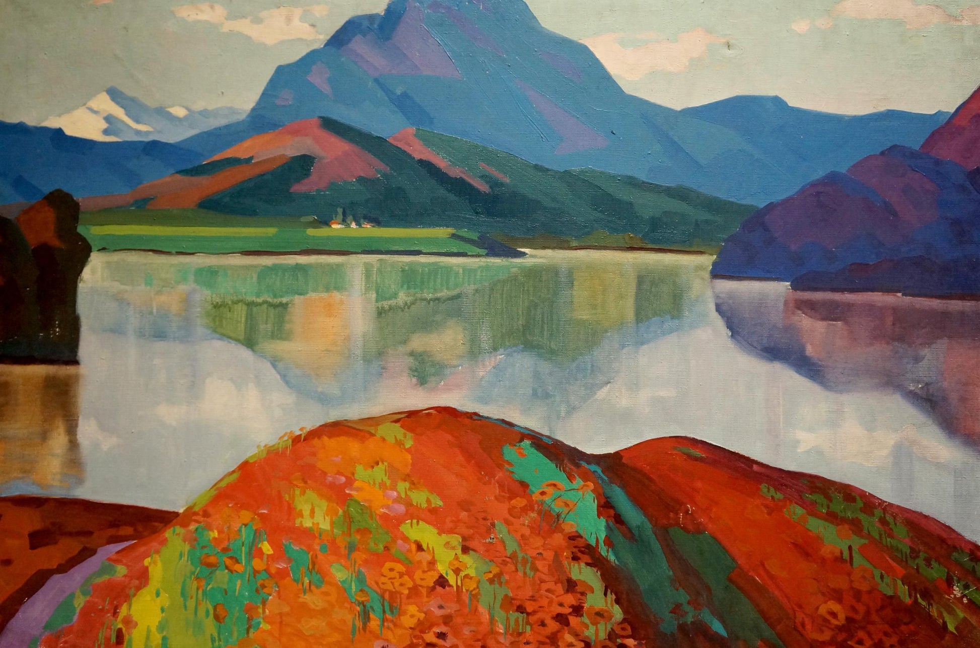 Oil painting by Atayan Armen Arshakovich: vibrant orange green landscape with purple mountains reflected in lake