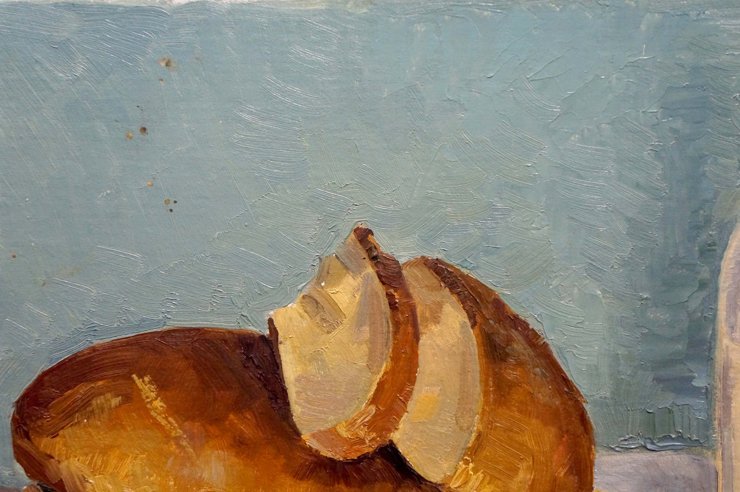 Rustic bread oil painting, golden crust and soft interior on table